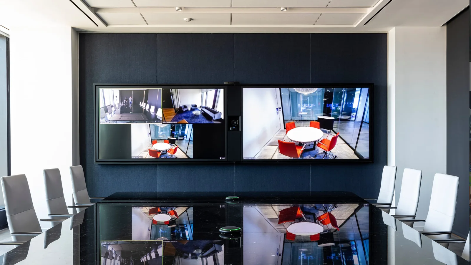 Boardroom with dual Edge Frame displays