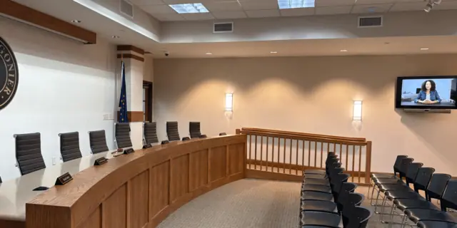 City of Ligonier council chambers with a video conferencing display