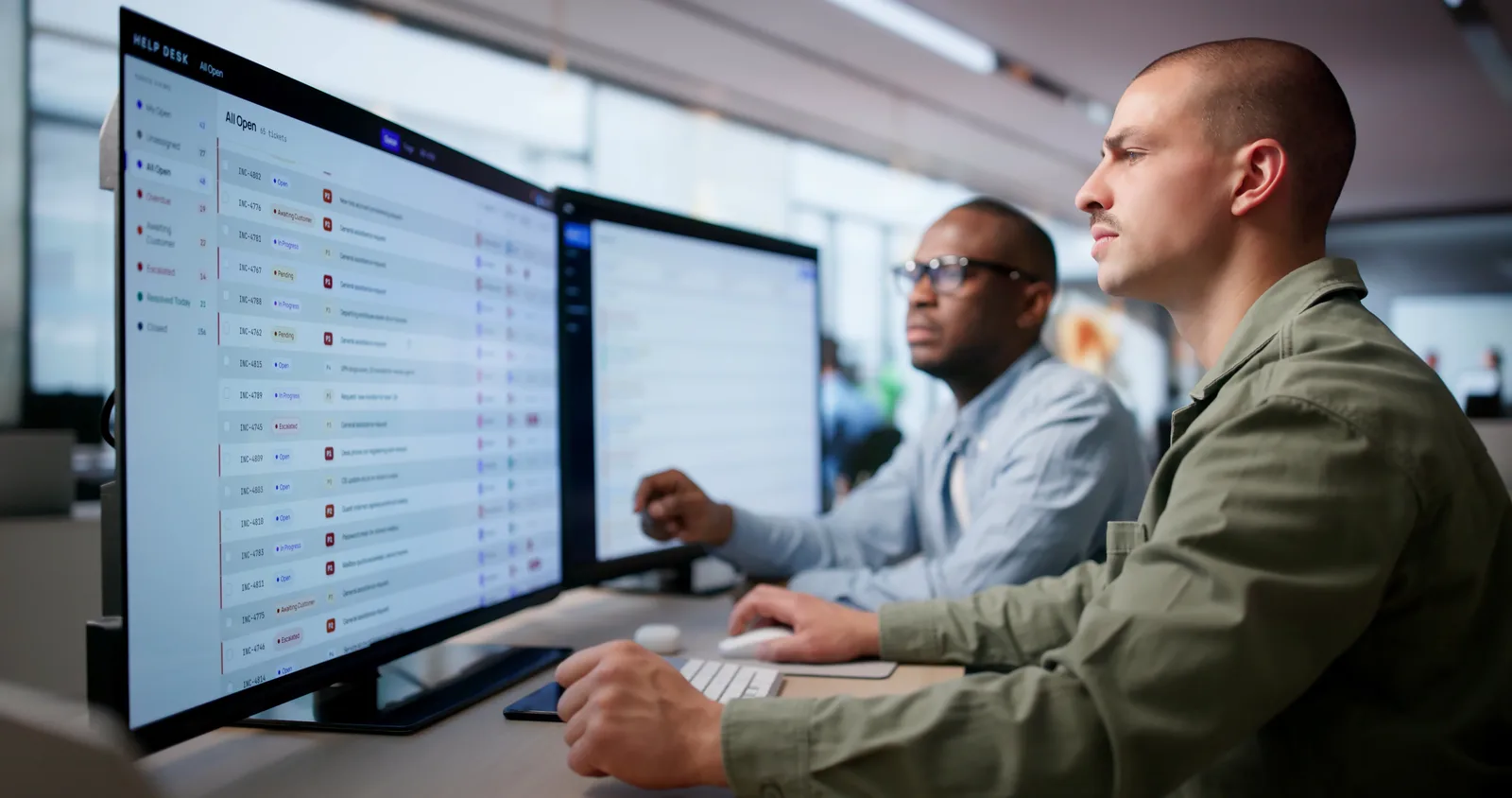 Help desk technicians at work
